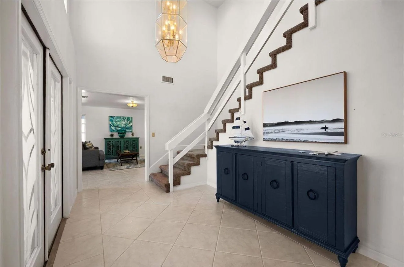 Foyer and staircase freshly painted in clean bright white